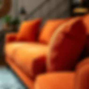 Texture and Material of Orange Sleeper Sofa Close-up of orange fabric sofa showcasing texture and materials