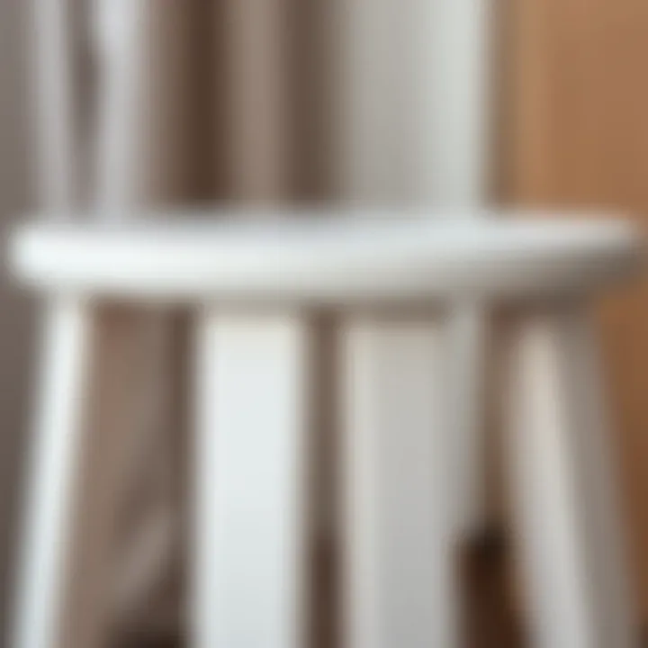 Detailed close-up of the texture of a white wooden stool